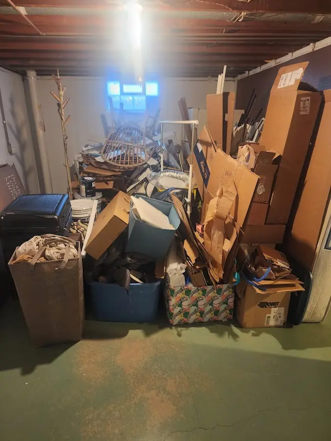 Roll-off dumpster container at job site for 4 Yard Dumpster Rental in Cedar Hill